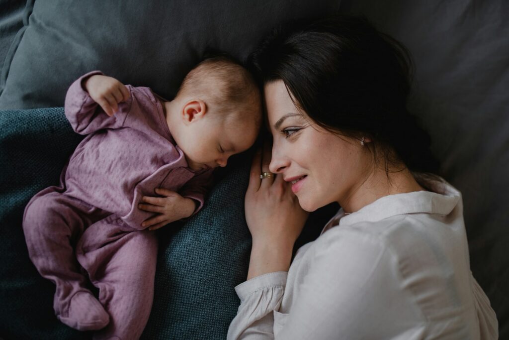 sleeping baby and mom