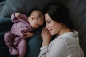 sleeping baby and mom